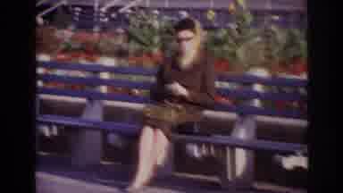 Rockaway Beach New York USA (1967): A Lady Puts On Gloves While Sitting On A Bench