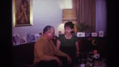 Rockaway Beach New York USA (1967): A Man And Woman Sit On A Couch And Socialize