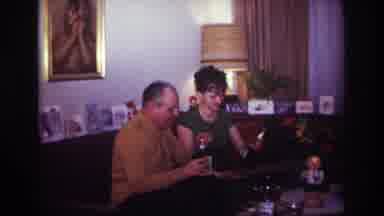 Rockaway Beach New York USA (1967): Two Older People On A Date Drinking In The
