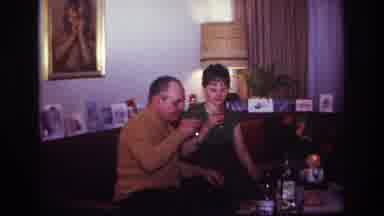 Rockaway Beach New York USA (1967): A Man And Woman Having A Toast At Home In