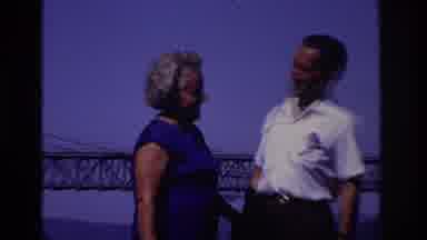 Ocean City New Jersey USA (1968): A Woman In A Blue Dress And A Man In A White