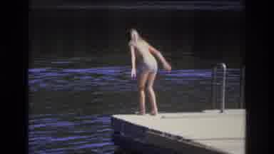 Ocean City New Jersey USA-1968: Kid Jumping Into Lake From Dock