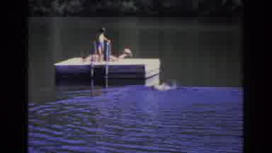 Ocean City New Jersey USA (1968): Sunbathing With Child On A Deck In An Extremely