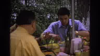 Ocean City New Jersey USA (1968): Three Men Eating While Another Man Is Talking