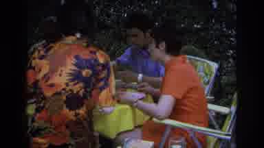 Ocean City New Jersey USA (1968): Family Eating At A Table While A Dog Plays With