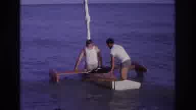 Ocean City New Jersey USA (1968): Men And Kids Preparing To Board Small Watercraft