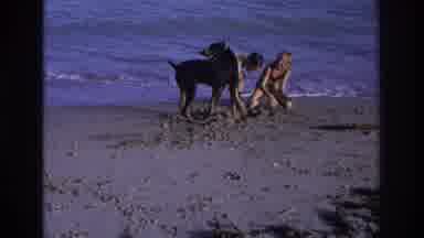 Ocean City New Jersey USA (1968): Kids On The Beach Having Fun Playing With Their