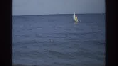 Ocean City New Jersey USA (1968): A Sail Boat Floating Along On A Calm Open Sea