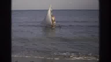 Ocean City New Jersey USA (1968): Two Men Sailing On Small Boat In The Middle Of