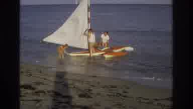 Ocean City New Jersey USA (1968): Family Of Three Trying To Stabilize Small Raft