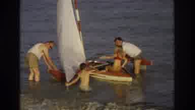 Ocean City New Jersey USA (1968): Two Men Preparing A Sailboat To Sail With Two