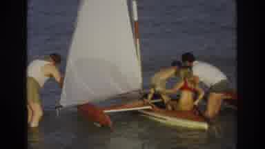 Ocean City New Jersey USA (1968): Young Children Getting Into A Small Kayak With A