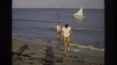 Ocean City New Jersey USA (1968): Men And Dog Walking Along On Beach Shore