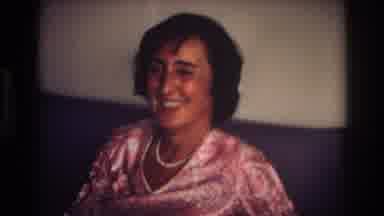 Ocean City New Jersey USA (1968): Woman In Pink Blouse With White Necklace Smiles
