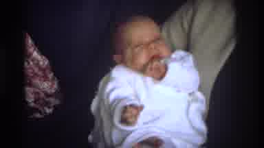 Ocean City New Jersey USA (1968): Cute Tiny Baby Wearing White Falling Asleep In