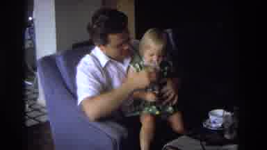Ocean City New Jersey USA (1968): Father And Baby Spending Time Together While
