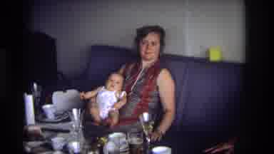 Ocean City New Jersey USA (1968): A Woman Sits On A Sofa With A Baby In Her Lap