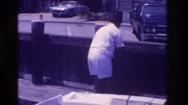 Ocean City New Jersey USA (1968): Guy At The Coast Catches Something On String And