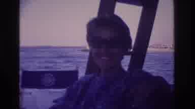 Ocean City New Jersey USA (1968): Woman Wearing Sunglasses Tries Hiding From