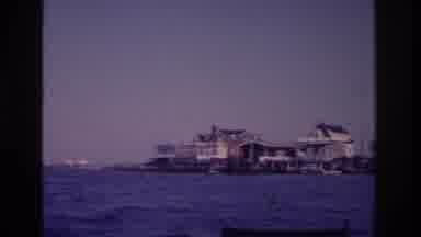 Ocean City New Jersey USA (1968): Moving Upon Water Ripples Boy Is Waving Smiling