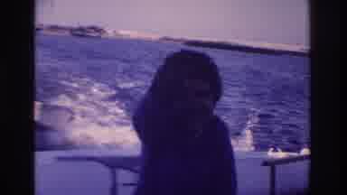 Ocean City New Jersey USA (1968): Boy In Boat Saluting
