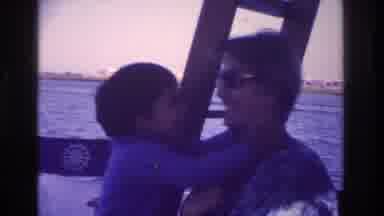 Ocean City New Jersey USA (1968): Boy Hugging Mom On Boat