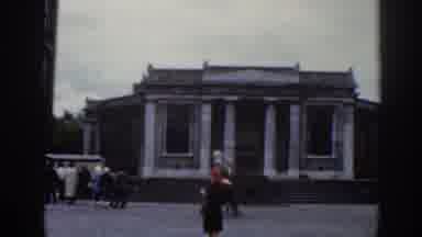 Dublin Ireland (1961): Past Town With People Walking Going About Their Day In The