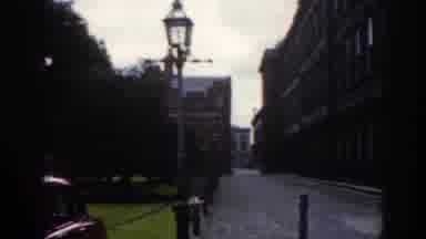 Dublin Ireland (1961): Historical Buildings Being Showcased While Woman Waves Into