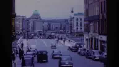 Dublin Ireland (1961): Busy City Street In The 1960s Near A River