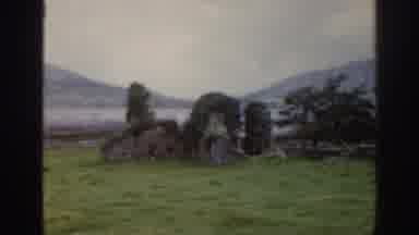 Ireland (1961): Panning Of Ruins With Moss Growing Over It In The Middle Of Nature