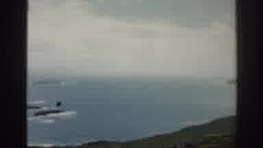 Ireland (1961): View From Plane Of Large Island Surrounded By Small Ones