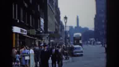 London England-1961: People And Cars On The Street Of A Big City