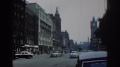 London England (1961): View Of Busy City Traffic Buildings And Clocktower During
