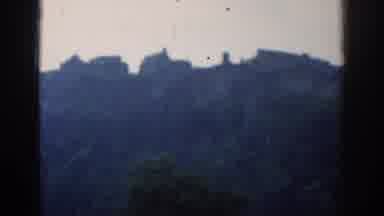 London England (1961): Long Distance View Of Buildings On The Top Of A Forested