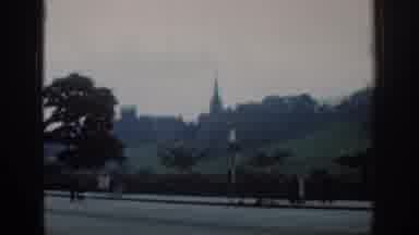 London England (1961): A Tall Building Is Seen Up Close And Then Far Away As