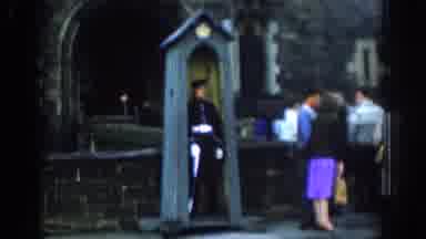 London England (1961): People Enjoying And Going About Their Day While Guard Is