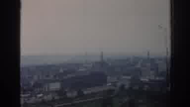 London England (1961): Horizon Shot Of City And Cut To Security Guard