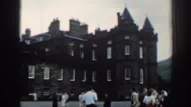 London England (1961): People Talking And Standing In The Daytime For A Event By A