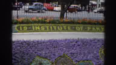 SCOTLAND-1961: Purple Flowers and Parent Child Walk Past Institute of Park Administration