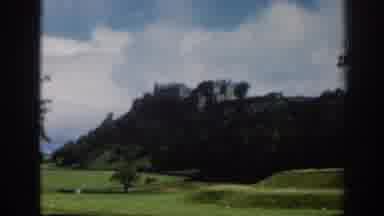 SCOTLAND-1961: Panoramic View of Edinburgh Castle from Grass Fields
