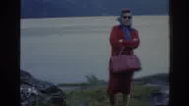 Scotland (1961): Woman Stands In Front Of Windy Lake Surrounded By Mountains And