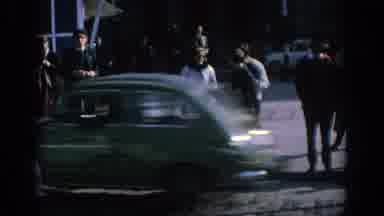 Spain (1966): Woman Considers Crossing The Street After Talking To Juveniles At A