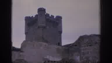 SPAIN-1966: Ruins Of Castle Area With Stone Towers And Battlements