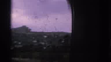 Spain (1966): Bus Trees Near Tall City Buildings On Gray Day And View From Window
