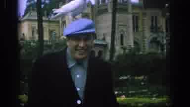Spain (1966): White Dove Goes From Man Shoulder To Top Of Head While Woman Looks