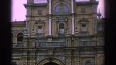 Spain (1966): Person Standing At Entrance Of Old Stone Cathedral Building Gates