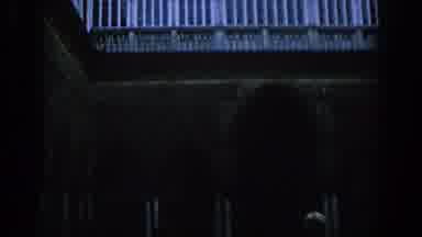 Spain (1966): Woman Walking Around An Old Building Looking For It's Structure
