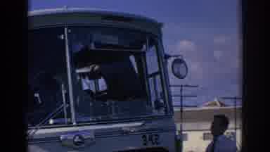 Spain (1966): Bus Accident With Window Broken And Repair Driver Directing Traffic