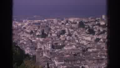 SPAIN-1966: Aerial View of Historic Hilltop City with White Buildings and Terracotta Roofs