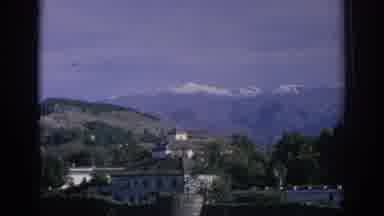 SPAIN-1966: Mansion with Snow Capped Mountains in Background